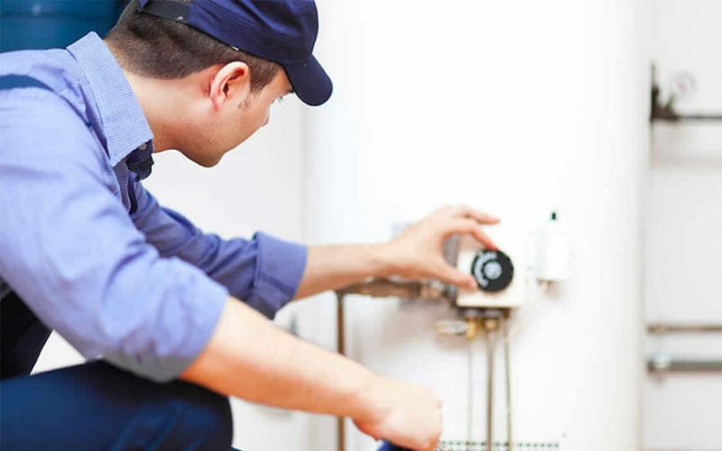 inspecting-plumbing-in-old-home-862x539